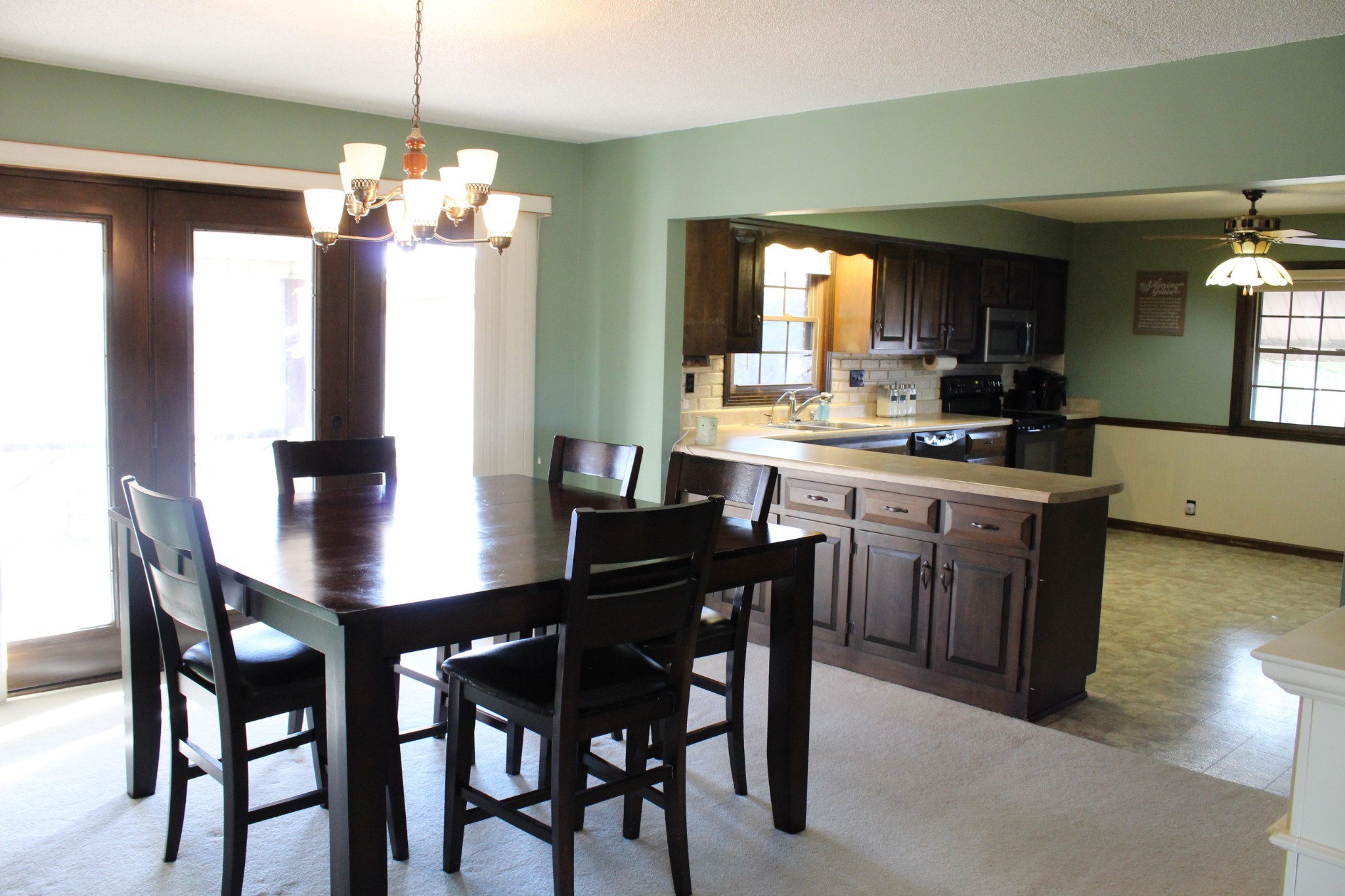 4165 Buckeye Road Cumberland City, TN 37050 - Photo 10 of 20 a view of a dining room with furniture and window