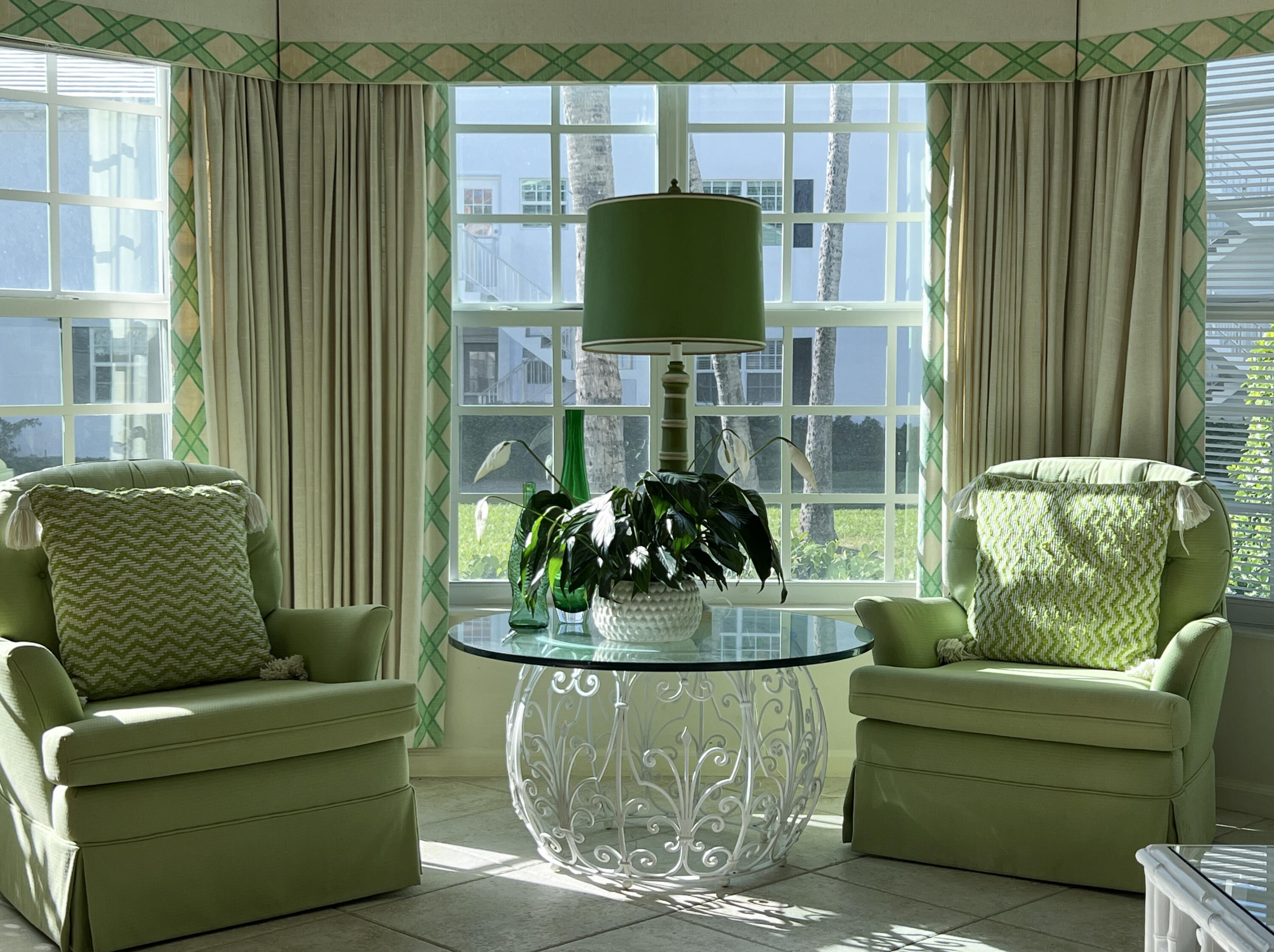 400 South Ocean Boulevard, Unit 103A Lake Worth, FL 33462 - Photo 4 of 12 a living room with furniture and a green gate