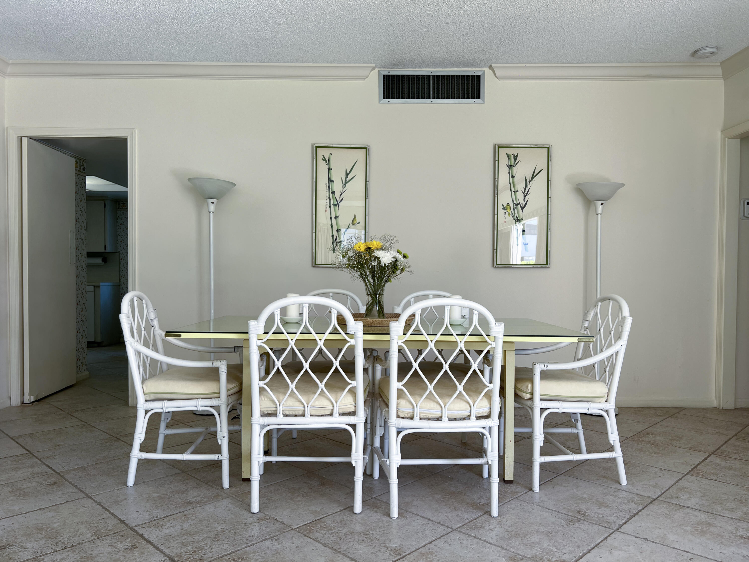 400 South Ocean Boulevard, Unit 103A Lake Worth, FL 33462 - Photo 8 of 12 a view of a dining room with furniture and wooden floor