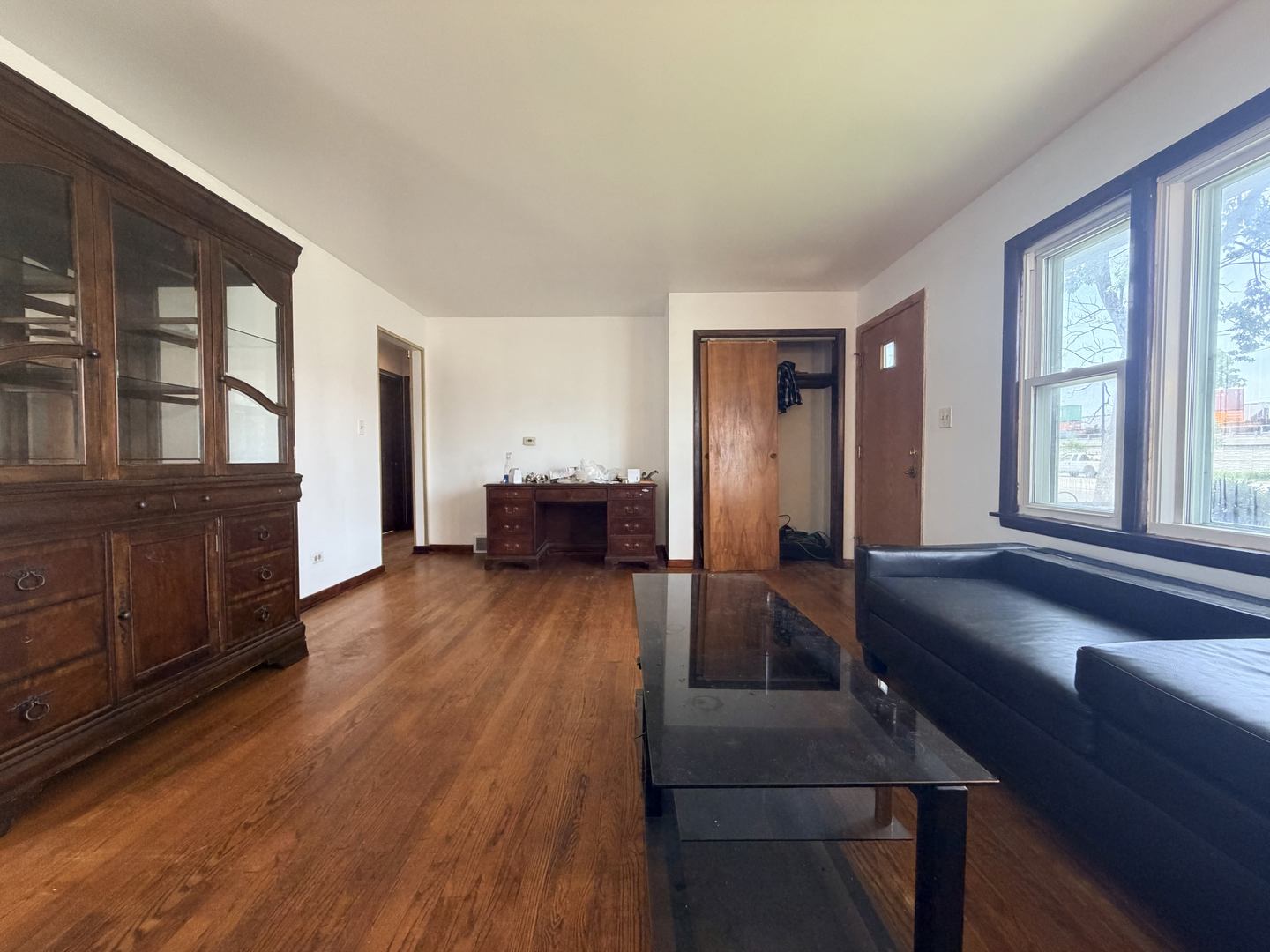 128 North York Road Bensenville, IL 60106 - Photo 9 of 39 a living room with furniture and a wooden floor