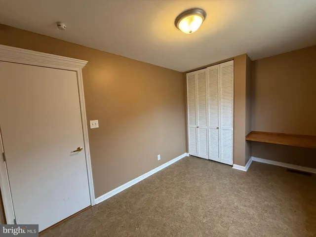 an empty room with closet