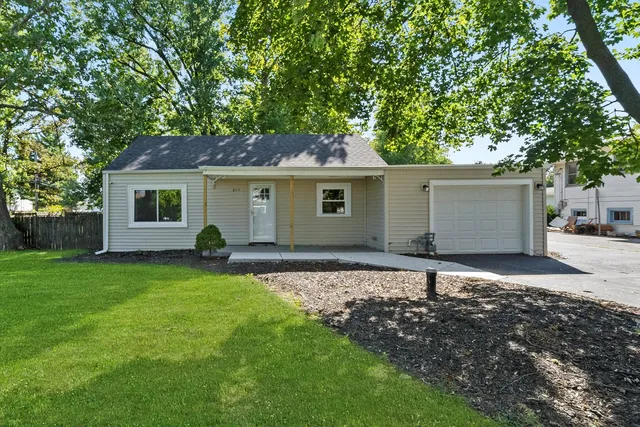 a house view with a garden space