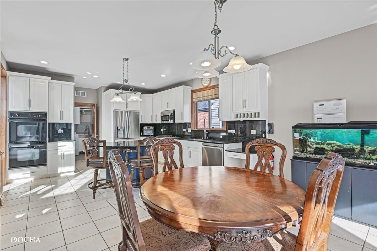 1107 Tuthill Road Naperville, IL 60563 - Photo 14 of 59 a view of a dining room with furniture