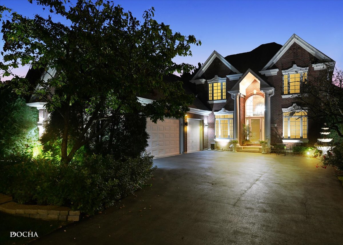 1107 Tuthill Road Naperville, IL 60563 - Photo 2 of 59 a front view of a house with a yard