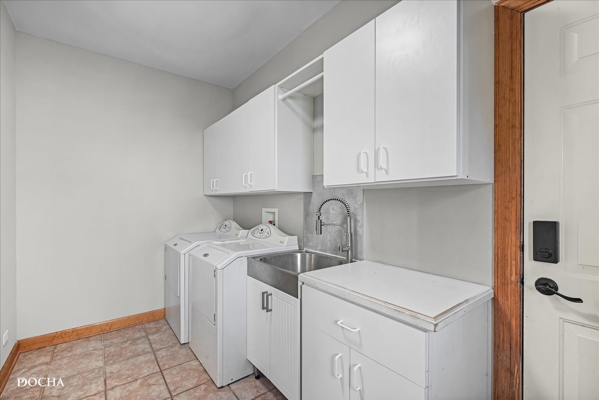 1107 Tuthill Road Naperville, IL 60563 - Photo 21 of 59 a utility room with sink dryer and washer