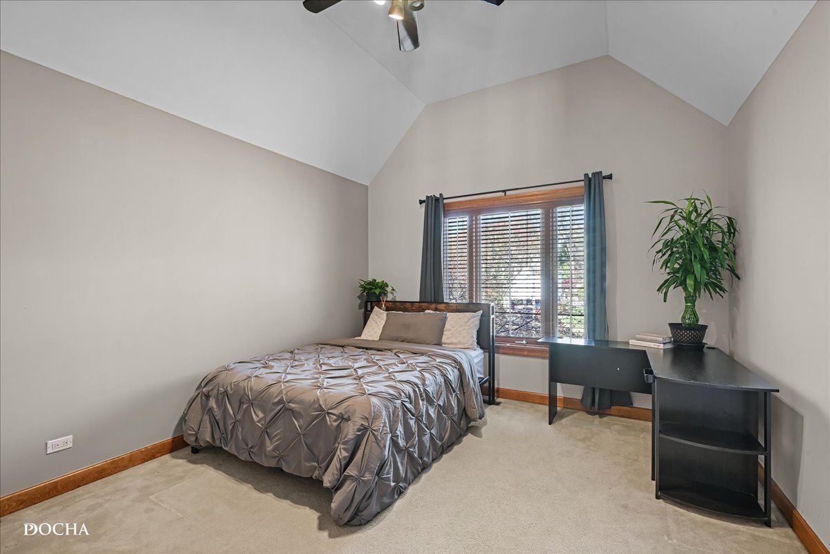 1107 Tuthill Road Naperville, IL 60563 - Photo 35 of 59 a bedroom with a bed and a potted plant