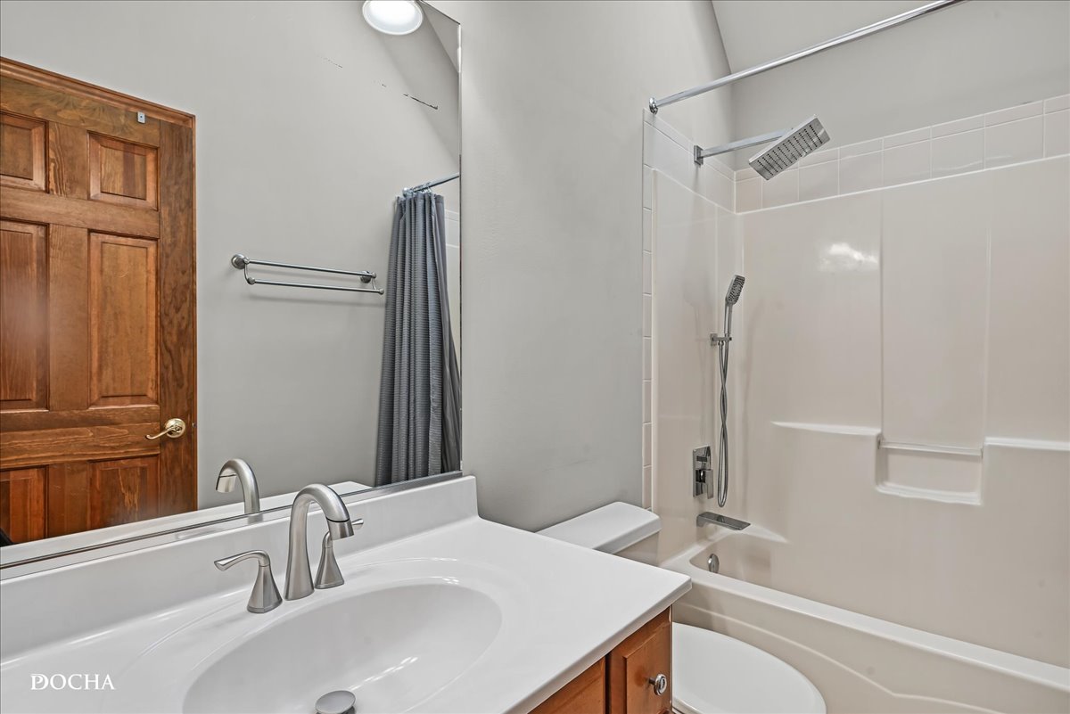 1107 Tuthill Road Naperville, IL 60563 - Photo 36 of 59 a bathroom with a sink and a mirror