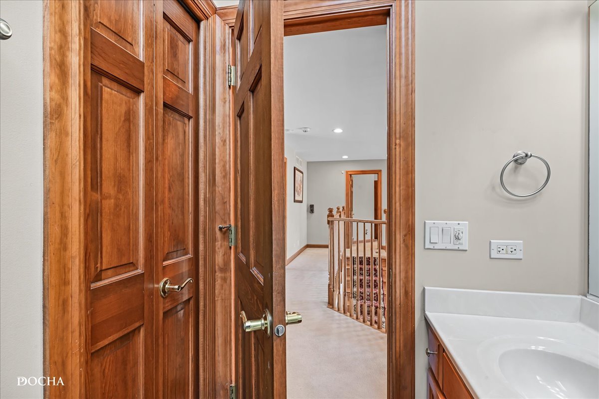 1107 Tuthill Road Naperville, IL 60563 - Photo 38 of 59 a bathroom with a tub sink and mirror