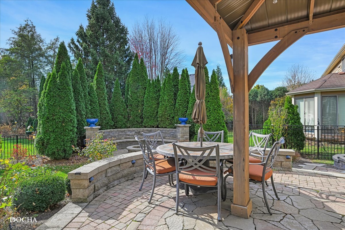 1107 Tuthill Road Naperville, IL 60563 - Photo 47 of 59 a view of backyard with outdoor seating and plants