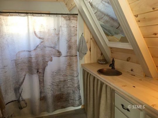 74 Adams Road Wofford Heights, CA 93285 - Photo 7 of 15 a bathroom with a sink and mirror