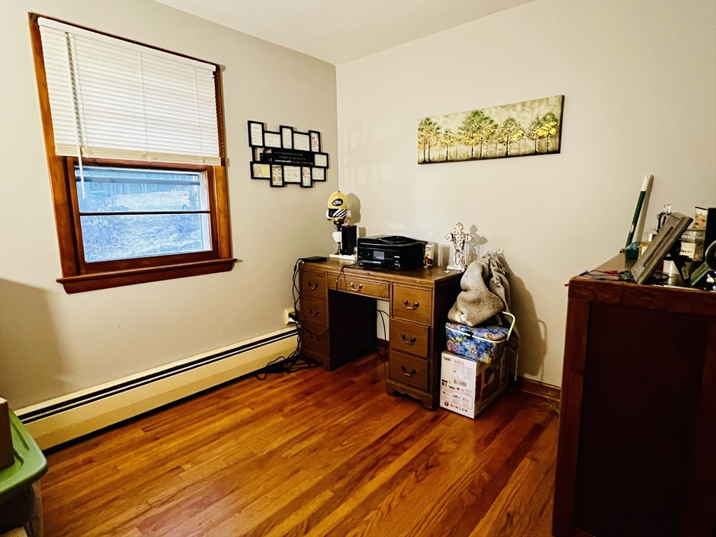 62 Arnold Road Sturbridge, MA 01518 - Photo 16 of 28 a view of a room with wooden floor and furniture