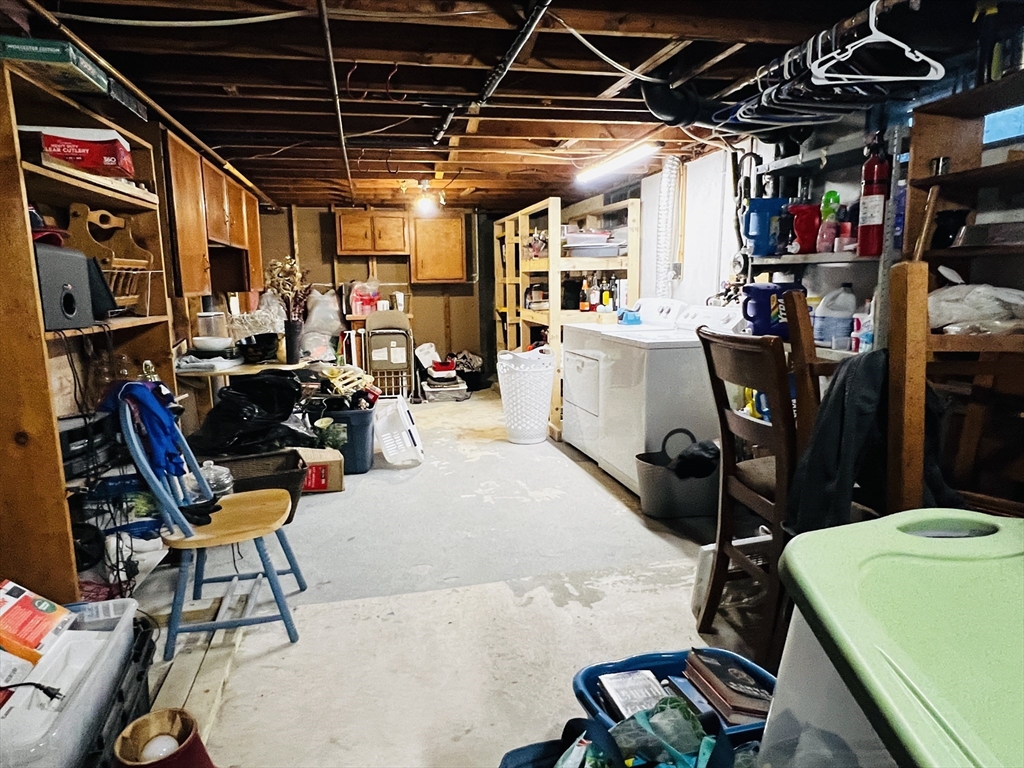 62 Arnold Road Sturbridge, MA 01518 - Photo 21 of 28 a view of a storage room with furniture