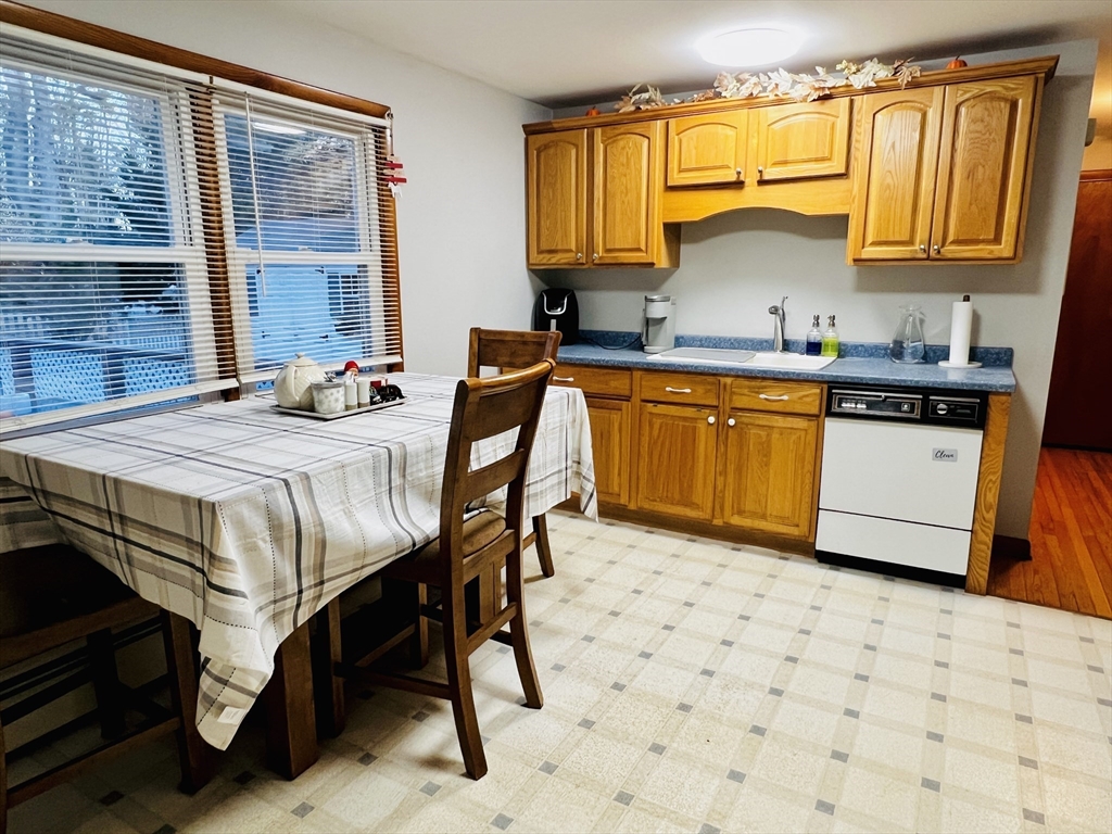 62 Arnold Road Sturbridge, MA 01518 - Photo 10 of 28 a kitchen with stainless steel appliances a stove a sink and a refrigerator