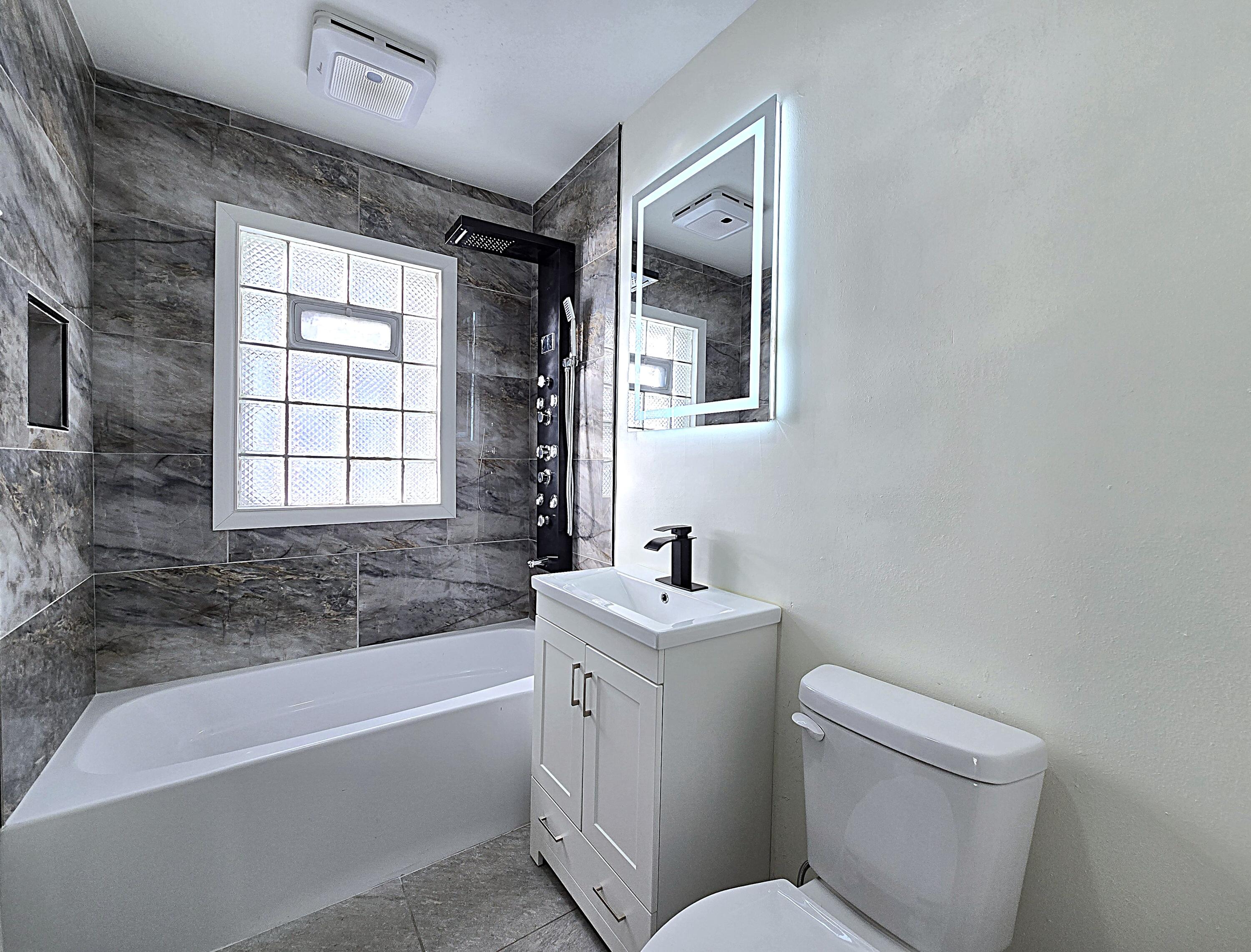 8114 West Congress Street Milwaukee, WI 53218 - Photo 17 of 39 Updated Bathroom