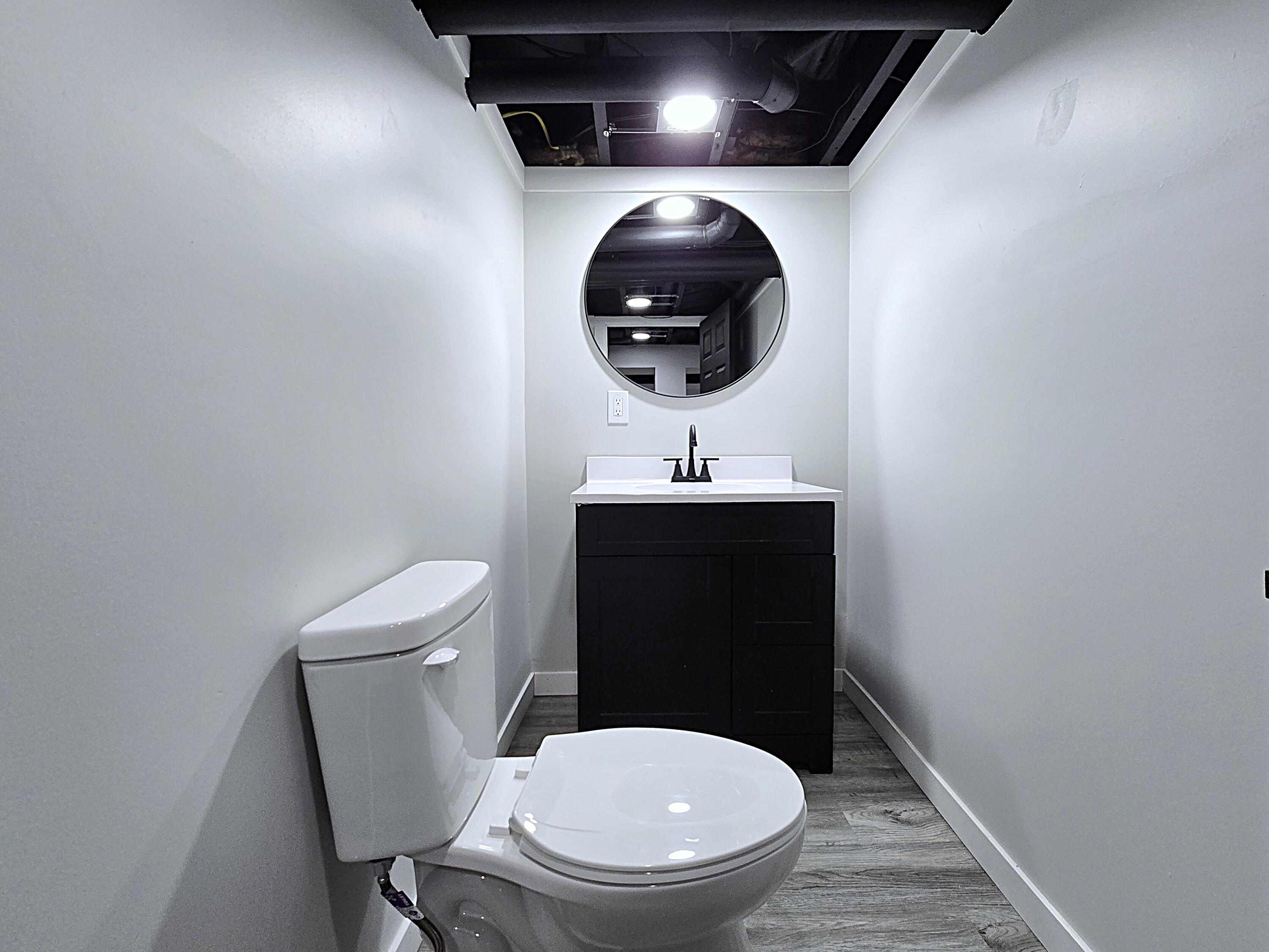 8114 West Congress Street Milwaukee, WI 53218 - Photo 34 of 39 Half Bath in Lower