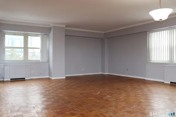 an empty room with windows