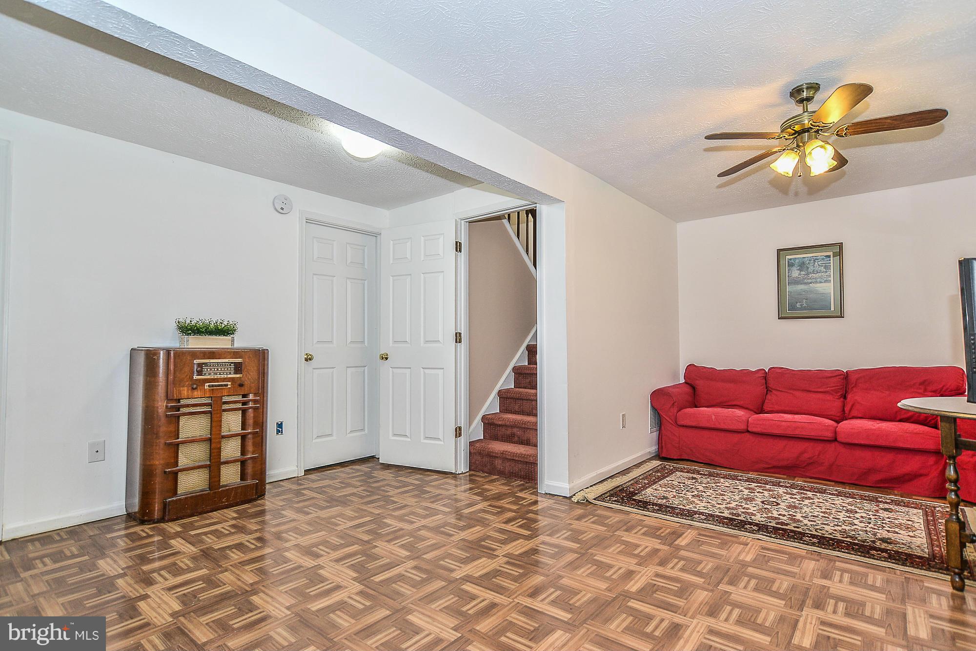 11790 Bayfield Court Reston, VA 20194 - Photo 22 of 25 a living room with furniture