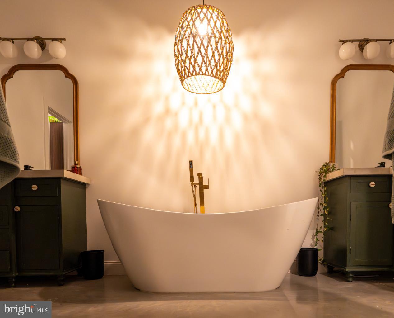 180 Gutshall Road Shippensburg, PA 17257 - Photo 12 of 37 a white tub sitting next to a bathroom sink