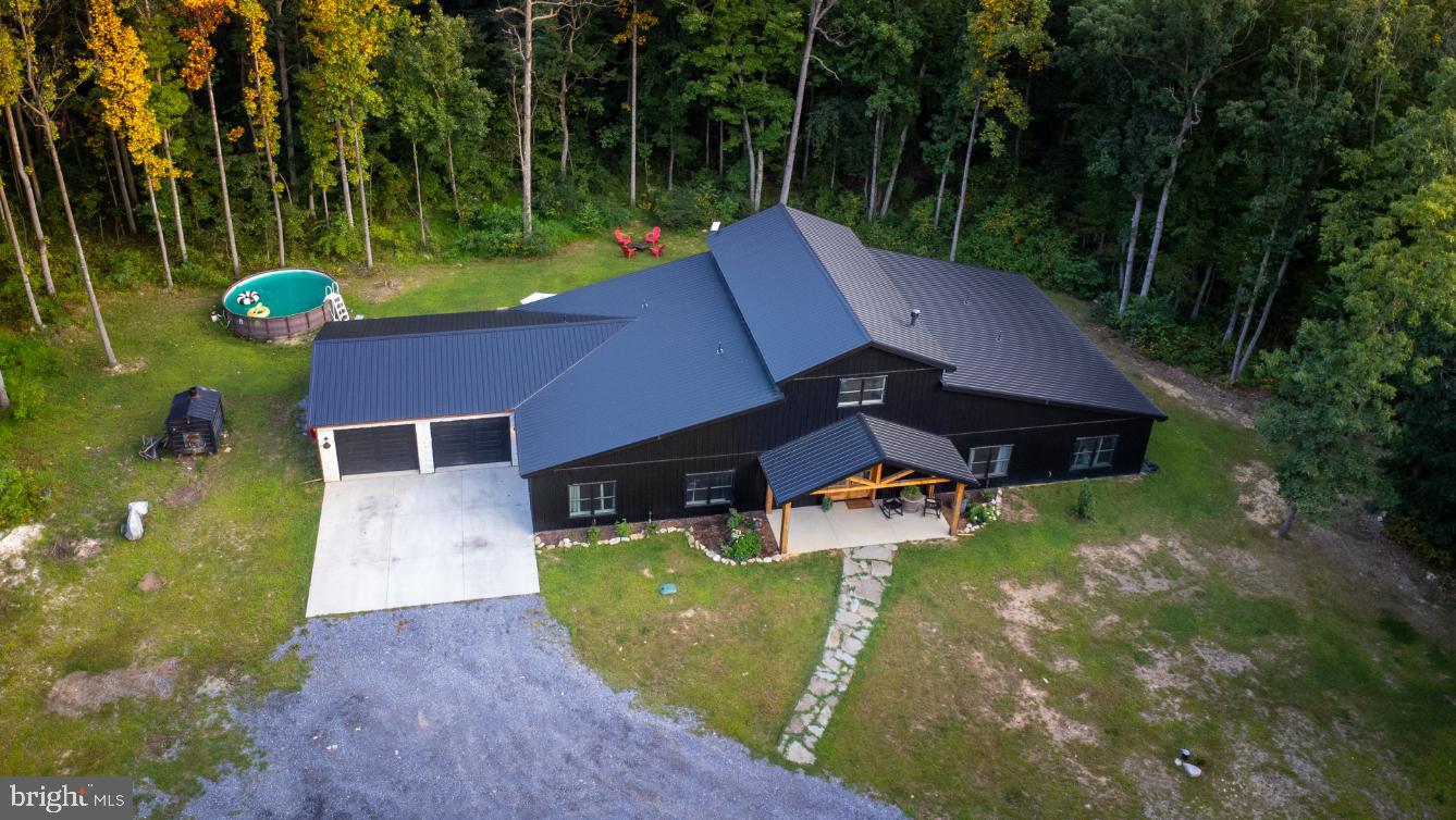 180 Gutshall Road Shippensburg, PA 17257 - Photo 2 of 37 an aerial view of a house with swimming pool garden and patio