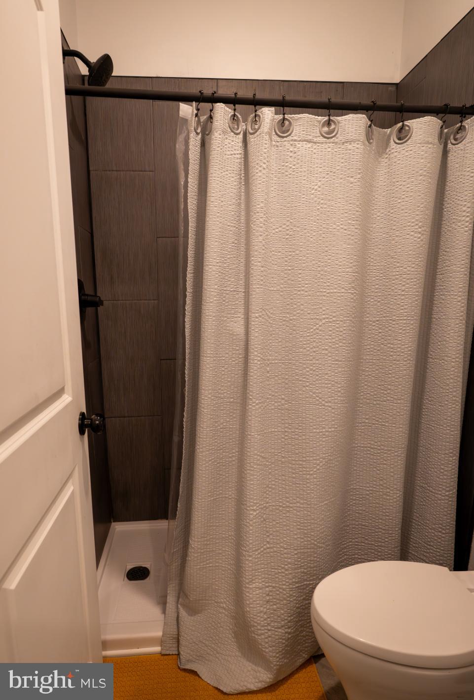 180 Gutshall Road Shippensburg, PA 17257 - Photo 29 of 37 a bathroom with a shower and a toilet