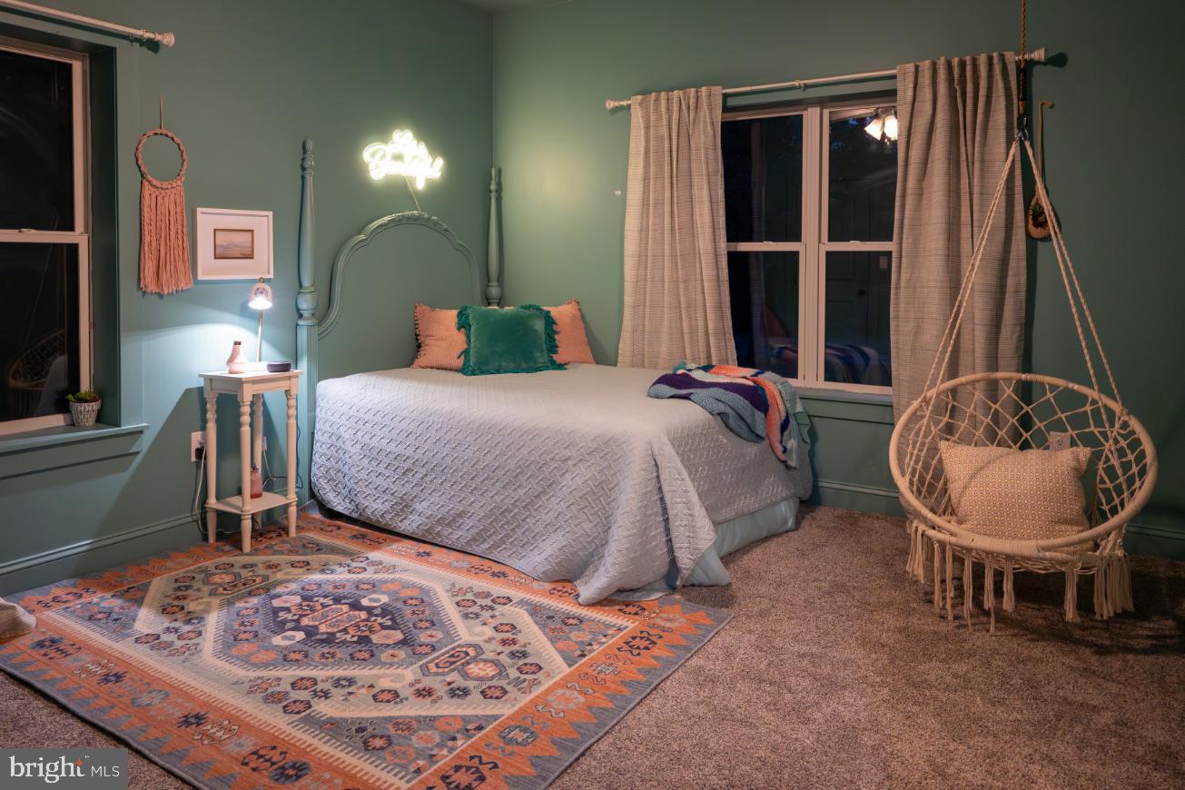 180 Gutshall Road Shippensburg, PA 17257 - Photo 31 of 37 a bedroom with a bed and a dresser next to a window