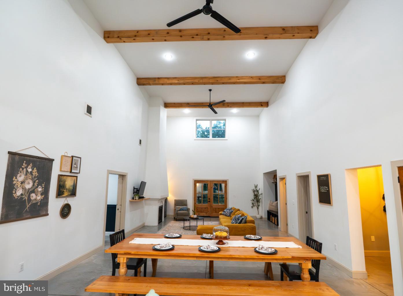 180 Gutshall Road Shippensburg, PA 17257 - Photo 4 of 37 a living room with fireplace furniture and a flat screen tv