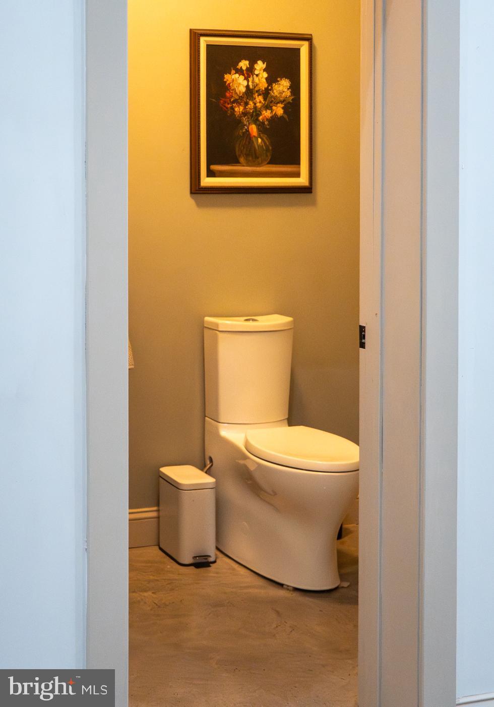 180 Gutshall Road Shippensburg, PA 17257 - Photo 8 of 37 a bathroom with a toilet and a picture on the wall