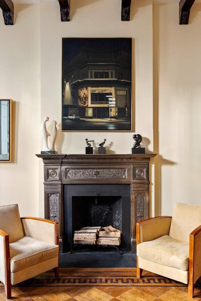 314 West 71st Street Manhattan, NY 10023 - Photo 5 of 19 a living room with furniture and a fireplace