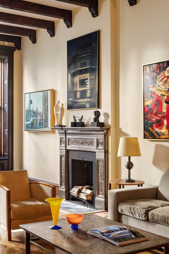 314 West 71st Street Manhattan, NY 10023 - Photo 6 of 19 a living room with furniture and a fireplace