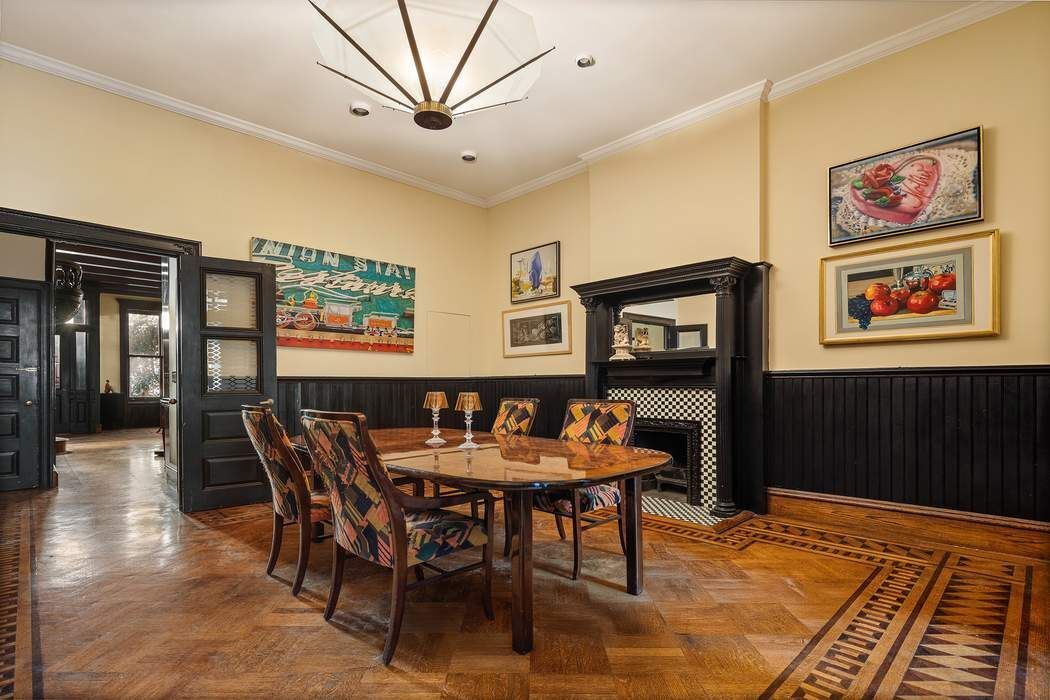314 West 71st Street Manhattan, NY 10023 - Photo 7 of 19 a view of a dining room with furniture