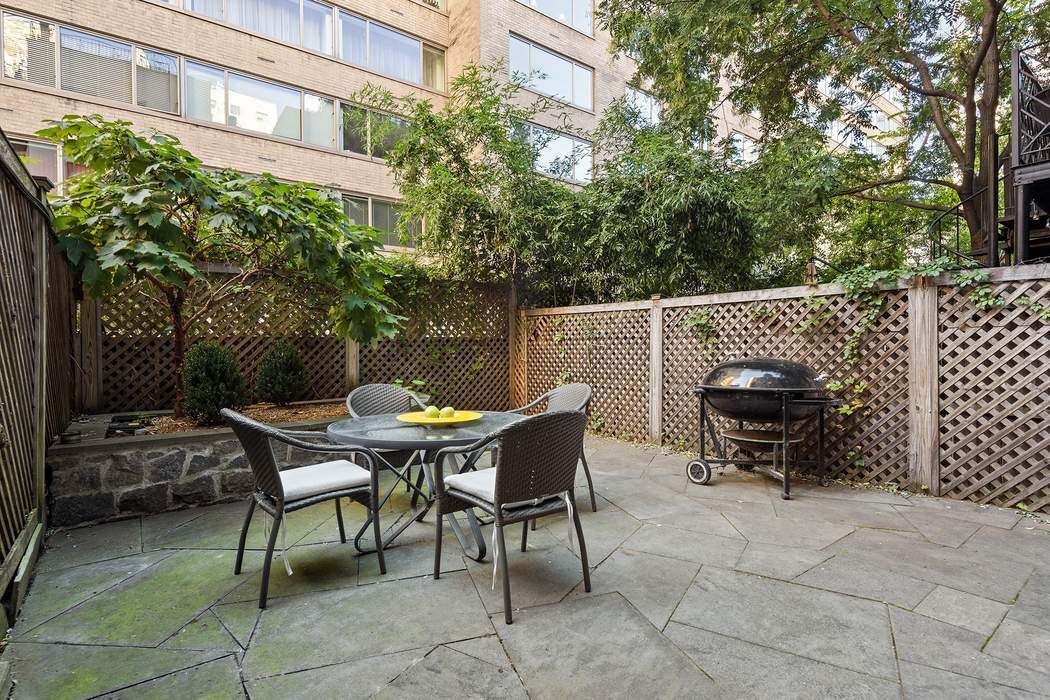 314 West 71st Street Manhattan, NY 10023 - Photo 8 of 19 a view of a patio with a table and a chairs