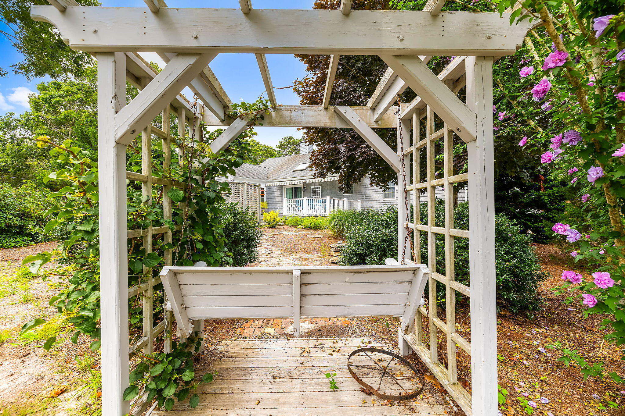 8 Seconsett Point Road Mashpee, MA 02649 - Photo 13 of 52 front view of a house with a small yard