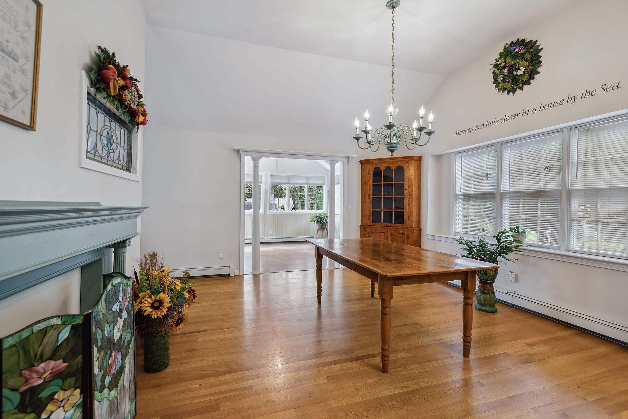 8 Seconsett Point Road Mashpee, MA 02649 - Photo 21 of 52 a view of a room with furniture wooden floor and chandelier