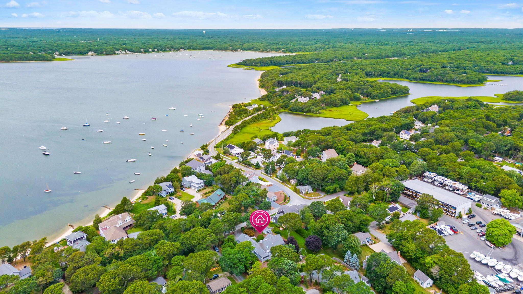 8 Seconsett Point Road Mashpee, MA 02649 - Photo 46 of 52 a view of a lake with a flower garden