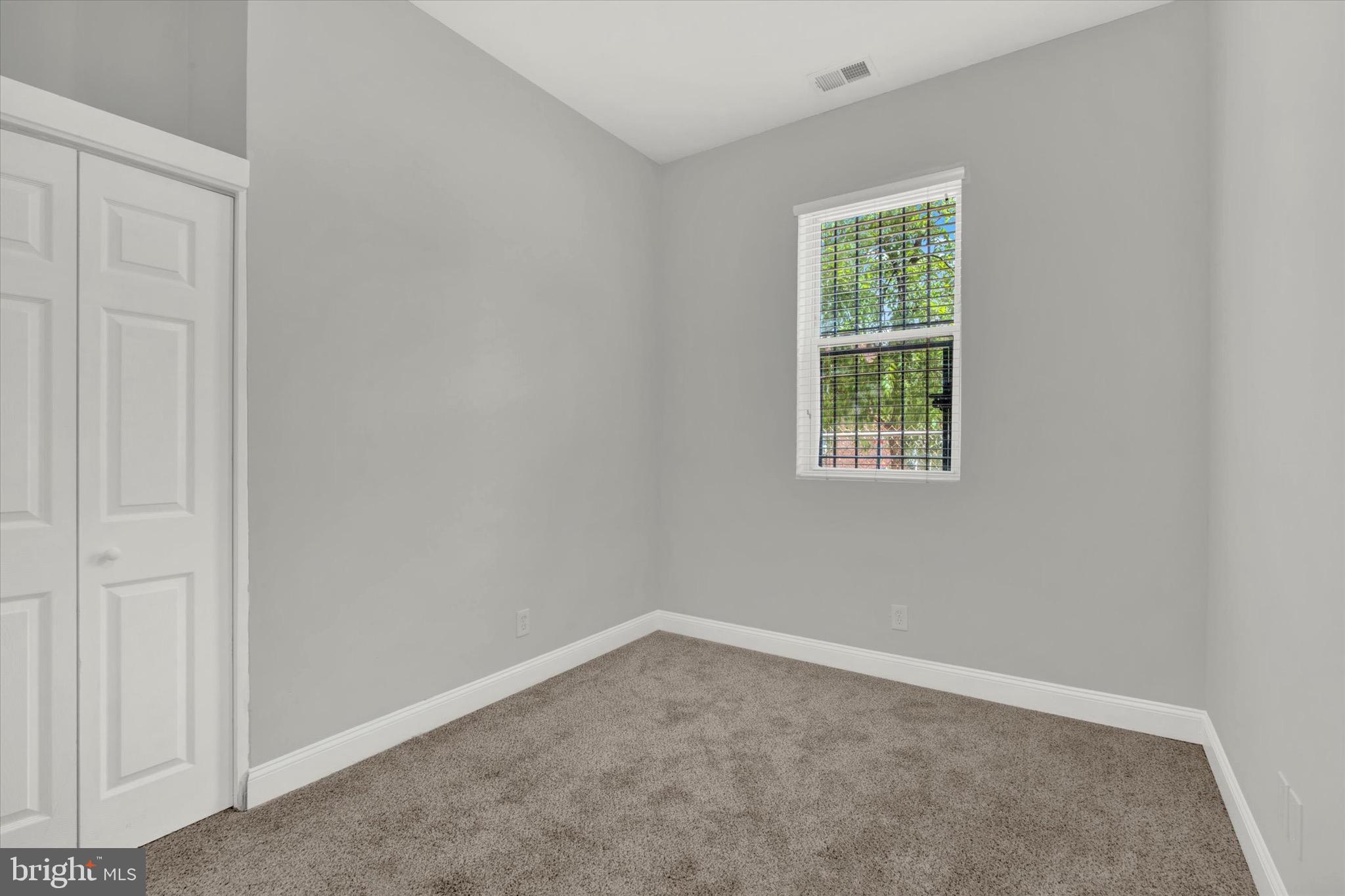 1679 Montello Avenue Northeast Washington, DC 20002 - Photo 21 of 38 an empty room with a window