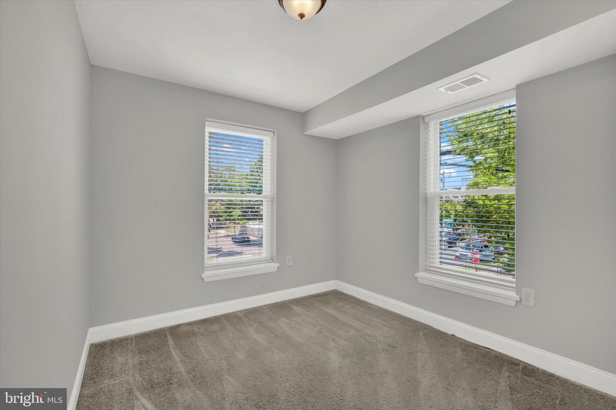 1679 Montello Avenue Northeast Washington, DC 20002 - Photo 23 of 38 a view of an empty room with a window