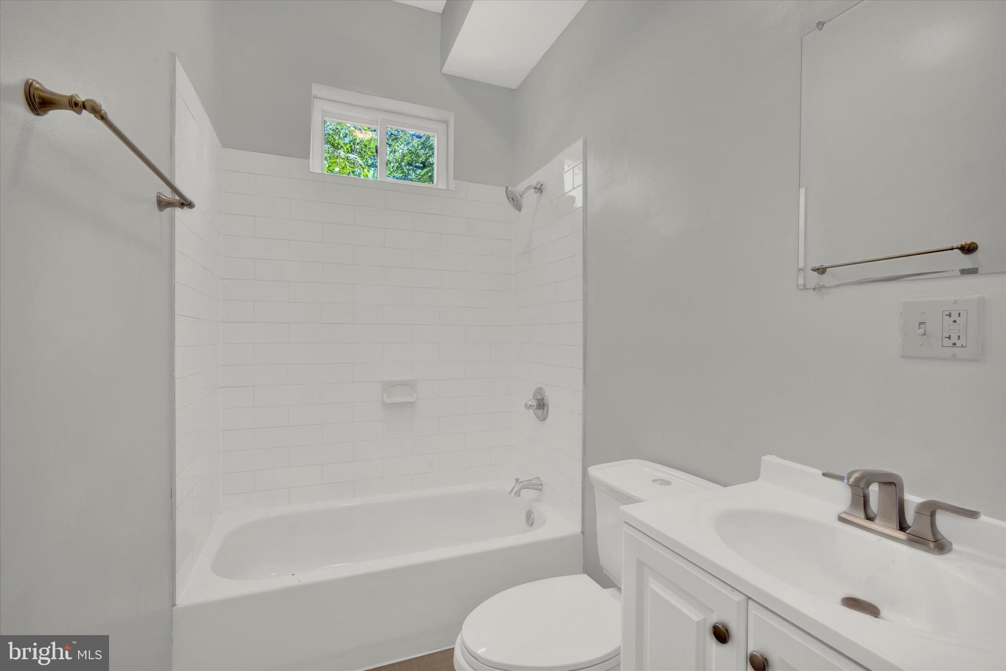 1679 Montello Avenue Northeast Washington, DC 20002 - Photo 25 of 38 a bathroom with a sink toilet and bathtub