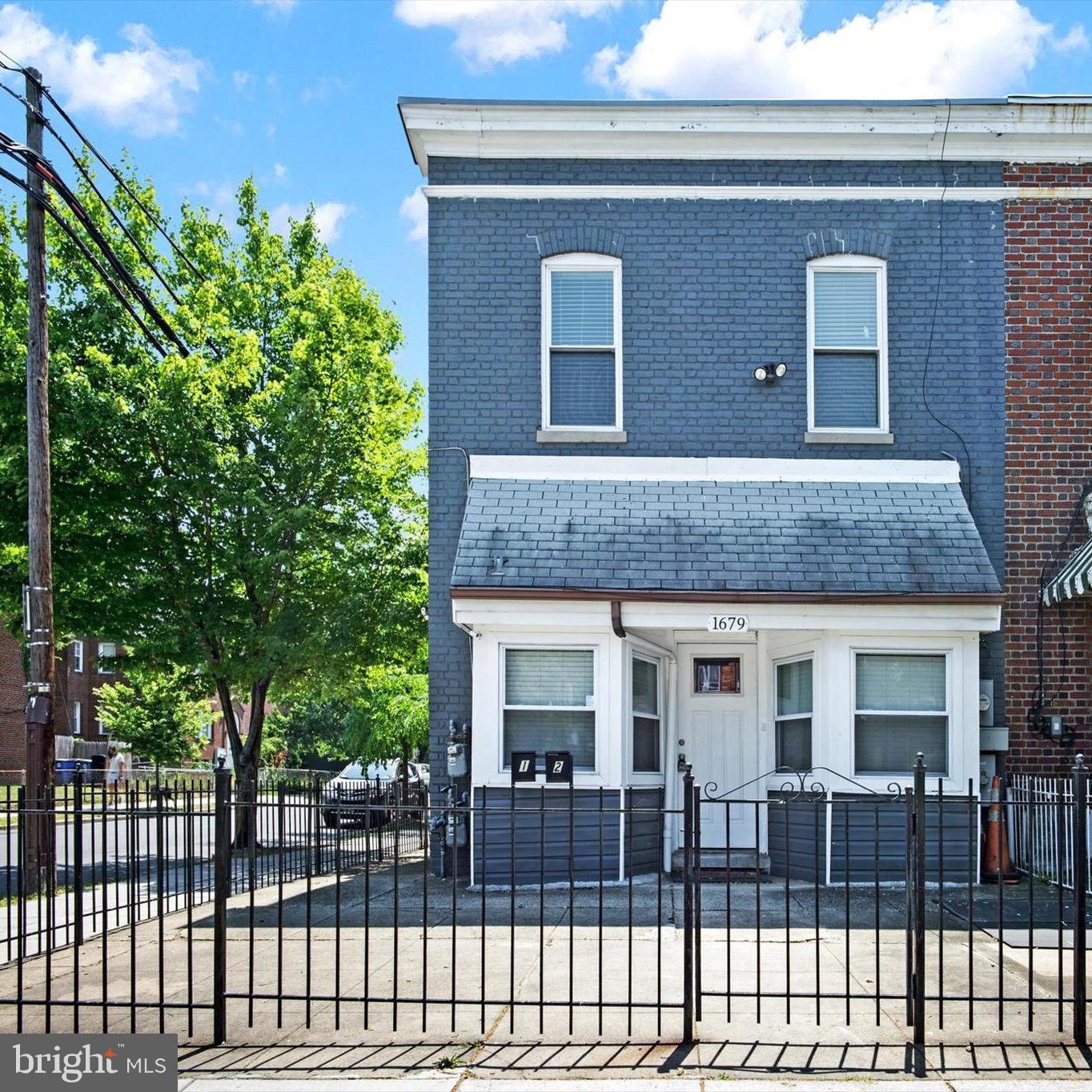 1679 Montello Avenue Northeast Washington, DC 20002 - Photo 3 of 38 a front view of house yard