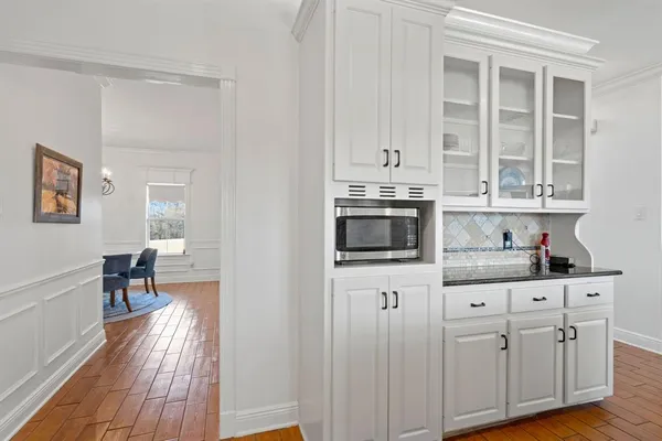 a kitchen with a stove and a refrigerator