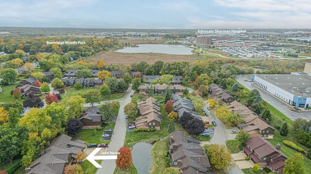 an aerial view of residential building with outdoor space