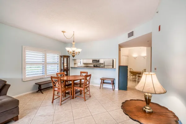 $388,990 | 800 Uno Lago Drive, Unit 105, Juno Beach, FL 33408