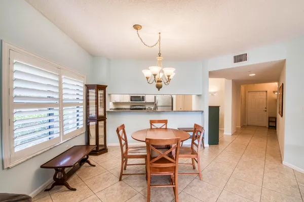 $388,990 | 800 Uno Lago Drive, Unit 105, Juno Beach, FL 33408