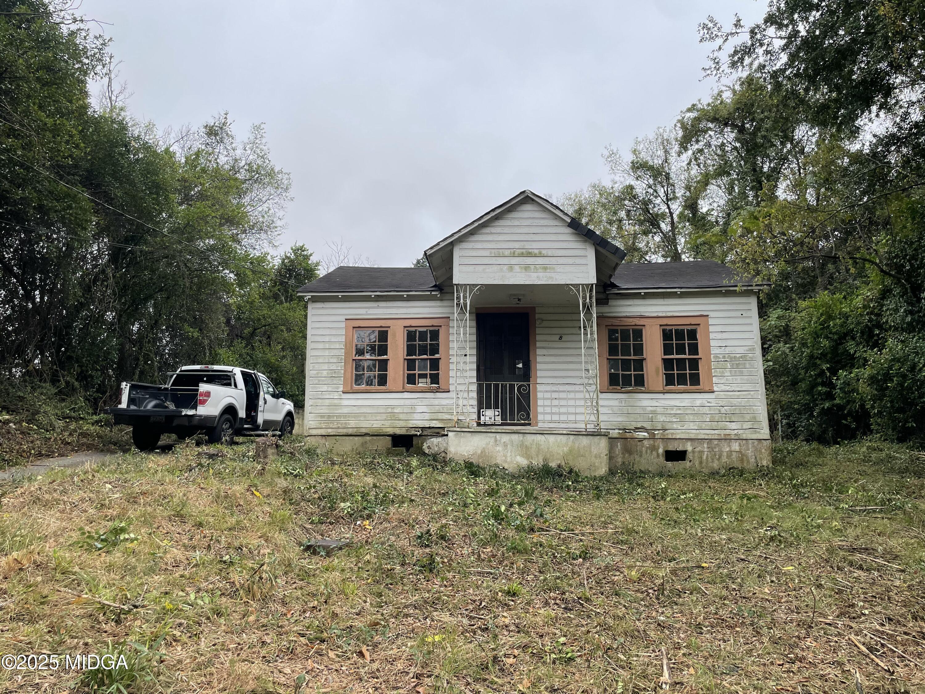 648 Hightower Road Macon, GA 31206 - Photo 2 of 21 a view of a house with a yard
