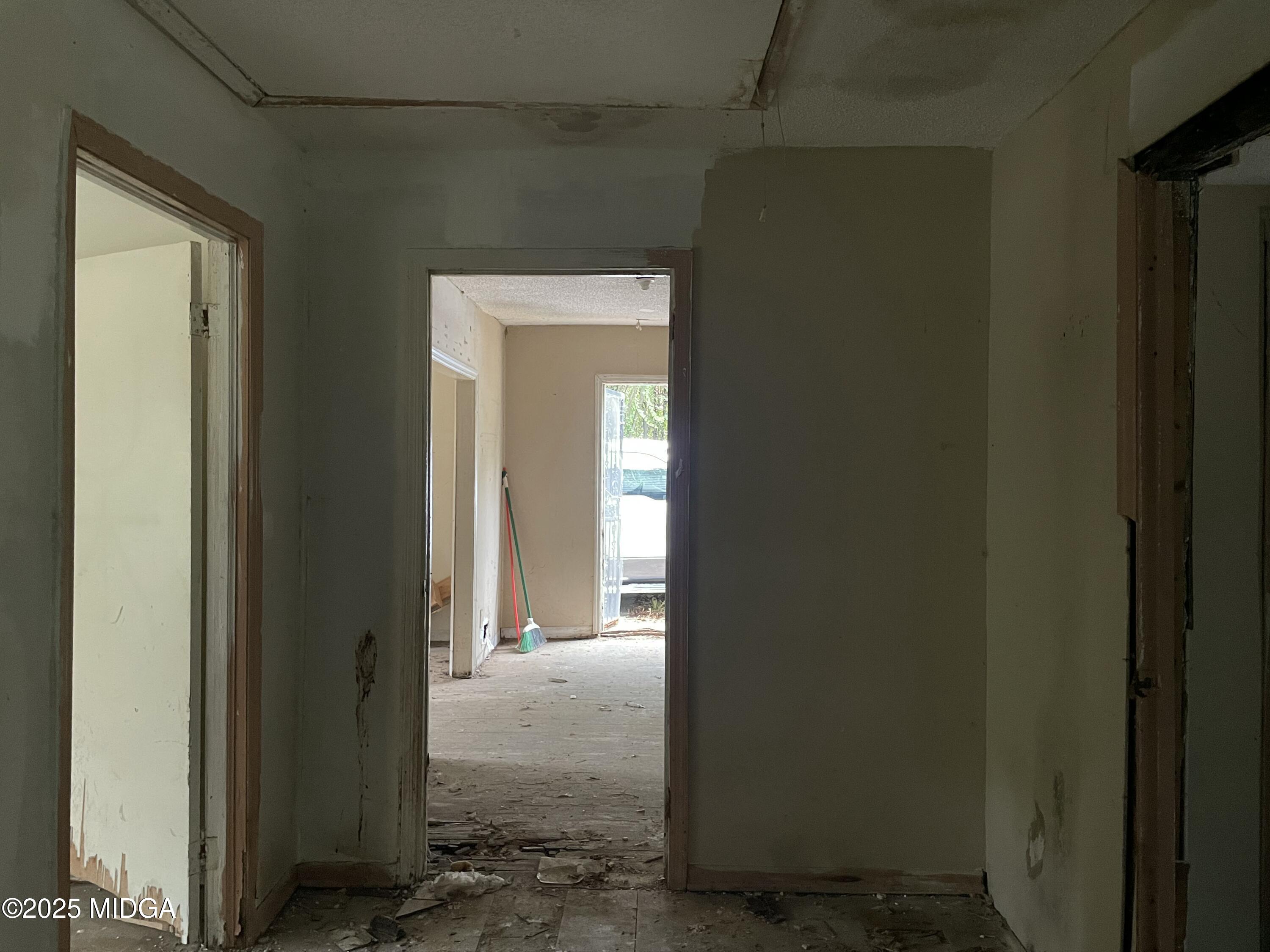 648 Hightower Road Macon, GA 31206 - Photo 9 of 21 a view of a hallway with a glass door