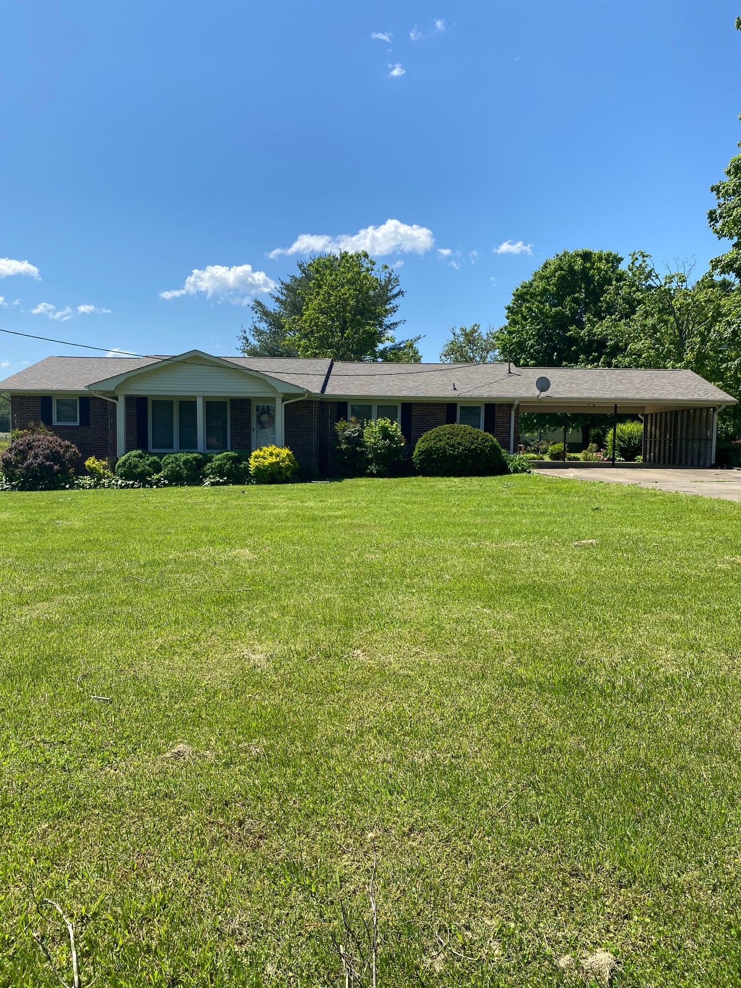 54 Purcell Road Leoma, TN 38468 - Photo 2 of 29 a front view of a house with a yard