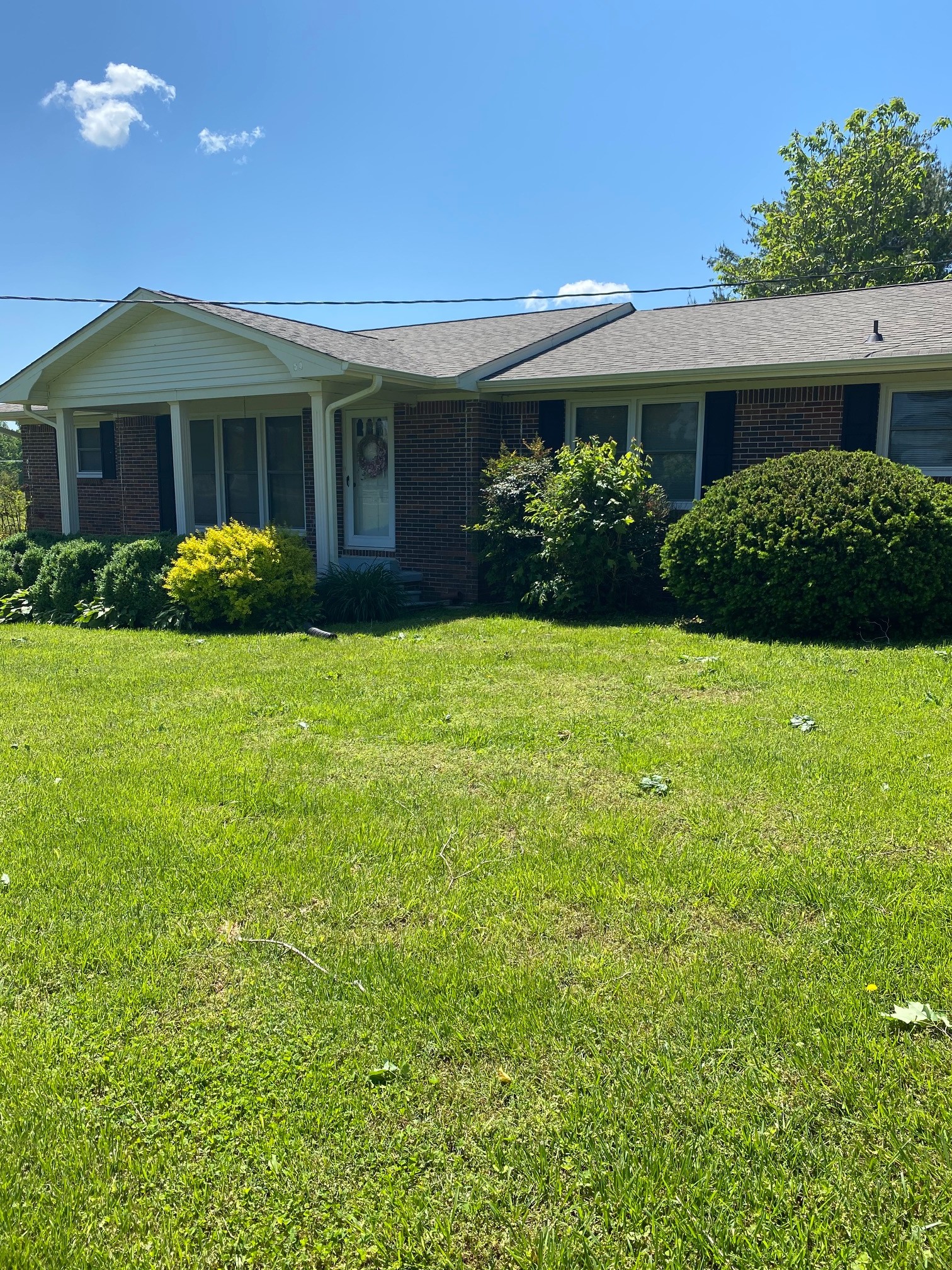 54 Purcell Road Leoma, TN 38468 - Photo 3 of 29 a view of a house with a garden