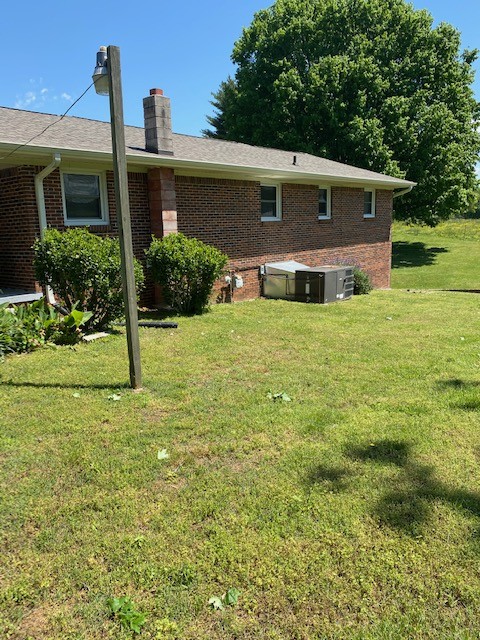 54 Purcell Road Leoma, TN 38468 - Photo 21 of 29 a front view of a house with garden