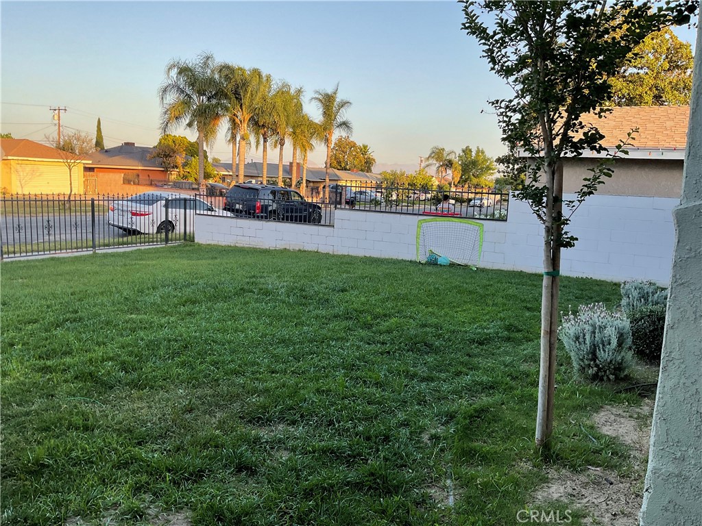 114 South Acacia Avenue Rialto, CA 92376 - Photo 14 of 21 a view of a garden