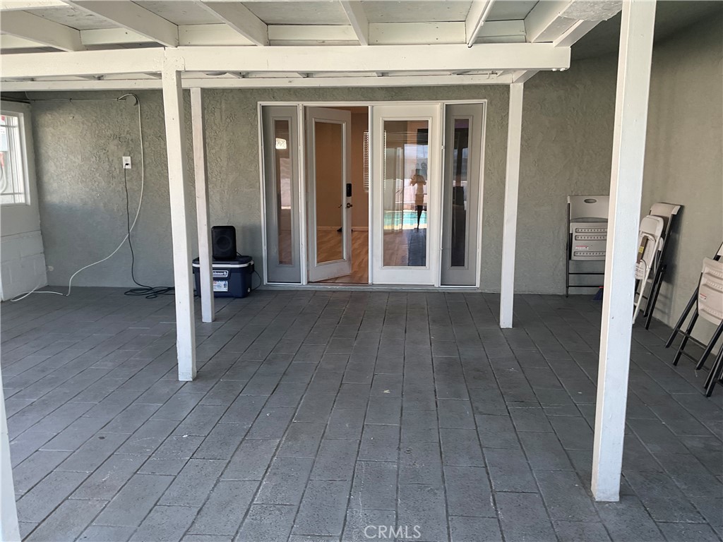 114 South Acacia Avenue Rialto, CA 92376 - Photo 21 of 21 an entryway of a house with wooden floor
