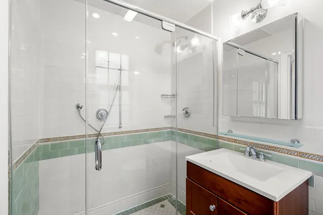 a bathroom with a sink and mirror